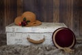 background white suitcase purple hat book Royalty Free Stock Photo