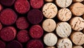 Background of wine corks. A set of red and white wine corks. Top view. Royalty Free Stock Photo