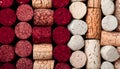 Background of wine corks. A set of red and white wine corks. Top view. Royalty Free Stock Photo