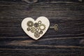 Background withs hape of hearts, the gear mechanism and a key on Royalty Free Stock Photo