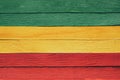 Background wood green, yellow, red old retro vintage style, rasta reggae flag Royalty Free Stock Photo