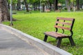 A wooden bench in the park