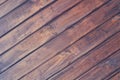 wooden boards laid on the diagonal, dark pink wood.