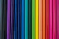 Background of wooden colorful pencils of different colours. Rainbow order.