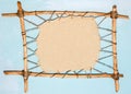 Background with wooden frame. Ancient billboard made of animal skin. Royalty Free Stock Photo