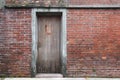 Old wooden gate in brick wall historic taipei