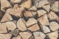 Background of wooden logs. Pile wood. Chopped wood. Woodpile scene. Close-Up of piled chunks of wood billet. selective focus Royalty Free Stock Photo