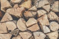 Background of wooden logs. Pile wood. Chopped wood. Woodpile scene. Close-Up of piled chunks of wood billet. selective Royalty Free Stock Photo