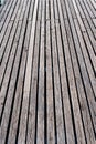 Background of wooden slats and boards on a boardwalk and dock on a lake