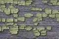 Background Wooden surface with cracked green paint