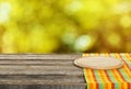 Background with wooden table with cutting board, close up