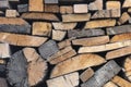 Background and wooden texture. Old firewood stacked in wood. Royalty Free Stock Photo