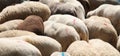 background of the woolly fur of the flock with many grazing shee