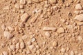 Pointed stones on sand. Sand and stone background Royalty Free Stock Photo