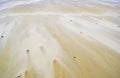 Background of yellow sand with stones
