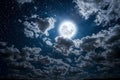 a backgrounds night sky with stars and moon and clouds. Elements of this image furnished by NASA