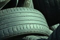 Backgrounds use car tires on in large pile