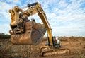 backhoe in action on a construction site close up Royalty Free Stock Photo