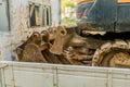 Backhoe attachments in back of truck