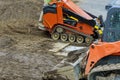Backhoe digging the ground during works at for soil construction Royalty Free Stock Photo
