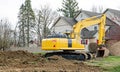 Backhoe Loader Excavating land Area