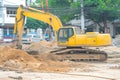 Backhoe Loader Working on Earthworks Project.