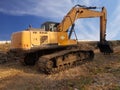 Backhoe to adjust the soil to prepare.