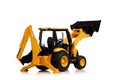 Backhoe tractor toy on white