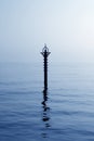 Backlight beacon in Mediterranean blue sea Royalty Free Stock Photo