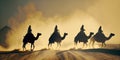 backlight of a Bedouin caravan with their camel in the dusty desert Royalty Free Stock Photo