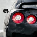 Backlight of black sport car Royalty Free Stock Photo