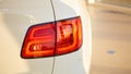 Backlight of white car style, tail, taillight, transport transportation white. Royalty Free Stock Photo