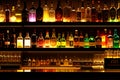 backlighted bottles club bar background Royalty Free Stock Photo