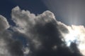 Backlit dark clouds with shafts of sunlight Royalty Free Stock Photo