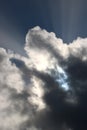 Backlit dark clouds with shafts of sunlight Royalty Free Stock Photo