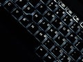 Backlit keyboard showing closeup of keys. Royalty Free Stock Photo