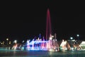 Backlit night fountain in a big city Royalty Free Stock Photo