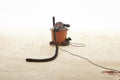 Shop vac. A vacuum cleaner used for tough jobs