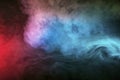 Backlit smoke abstract texture in red blue white on black background Royalty Free Stock Photo