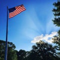 Backlit US flag in nature for Labor Photo