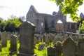 A backlit view of the ruins of the historic Greyabbey Monastery