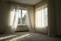Backlit Window with White Curtains in Empty Room Royalty Free Stock Photo