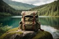 Backpack amidst a lush natural setting â thick forests, serene lakes and mountainous terrain