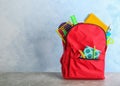 Backpack with different colorful stationery