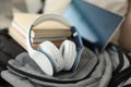 On backpack are headphones, a tablet and books Royalty Free Stock Photo