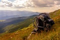Backpack, the main element or thing in the campaign, a backpack on the background of the Carpathian mountains, the Carpathians of Royalty Free Stock Photo