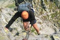 Backpack man climbing