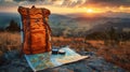 Backpack, map and compass on the background of the horizon. Royalty Free Stock Photo