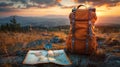 Backpack, map and compass on the background of the horizon. Royalty Free Stock Photo