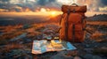 Backpack, map and compass on the background of the horizon. Royalty Free Stock Photo